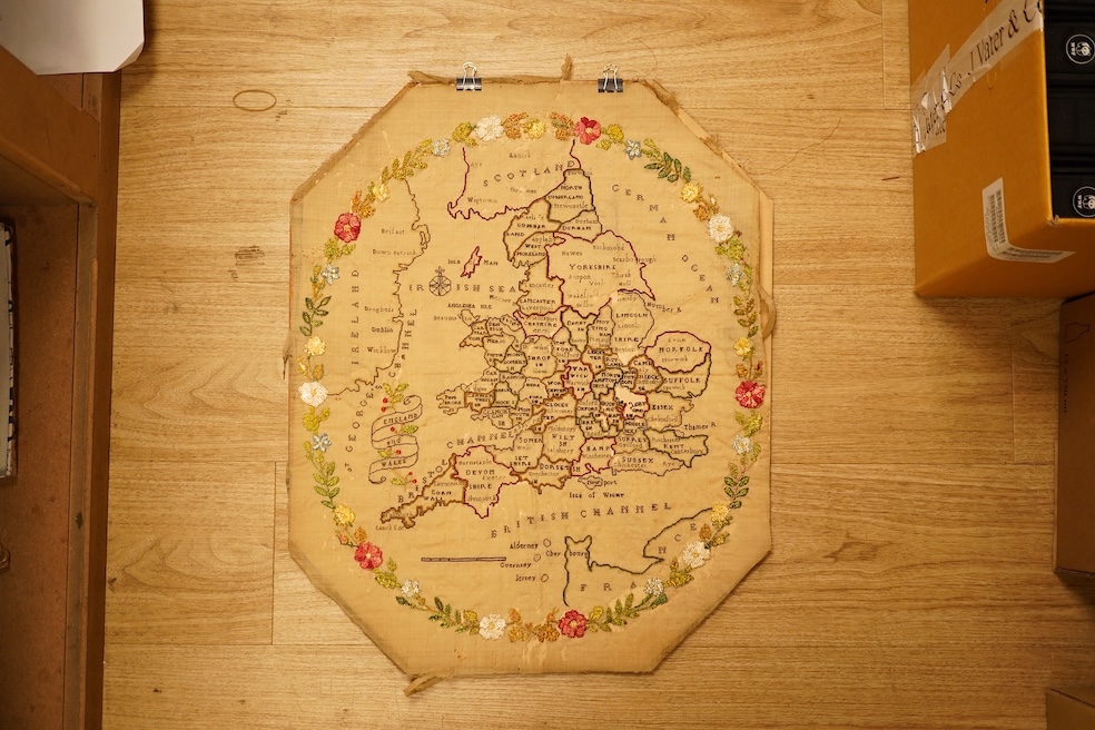 An 18th century embroidered map of England, unframed (distressed), 59cm high